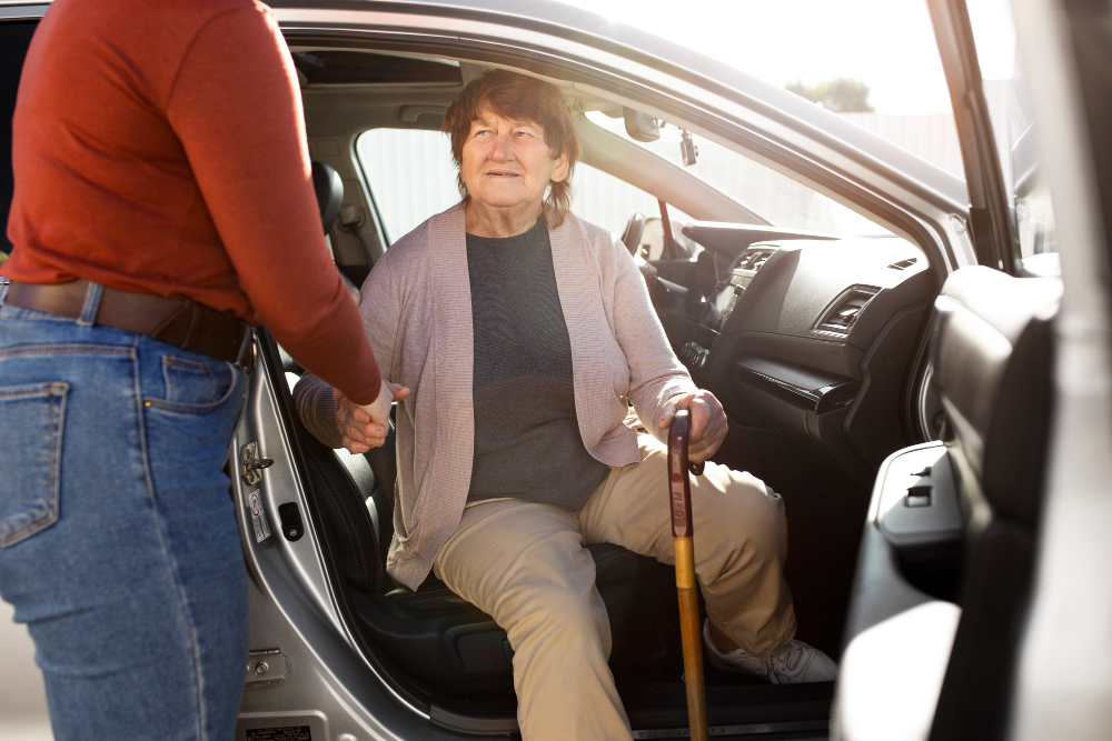 Caregiver providing transportation for a senior